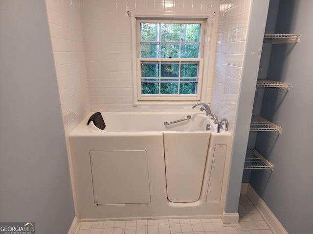 3054 Whisper Knob Rd, Marietta, GA 30062 - full bathroom with a bath and tile patterned flooring