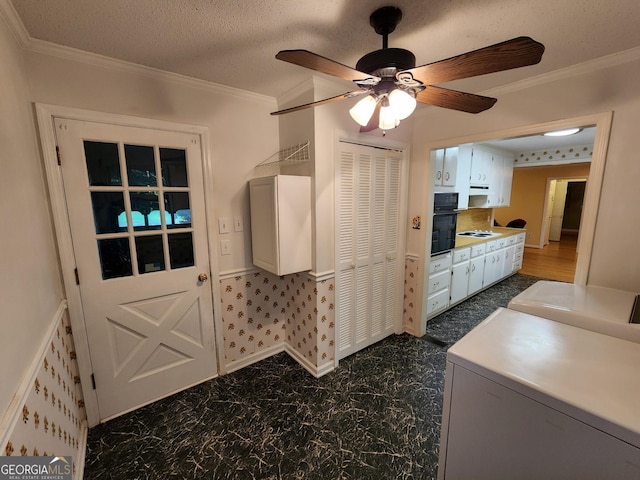 3054 Whisper Knob Rd, Marietta, GA 30062 - interior space featuring independent washer and dryer, ornamental molding, and ceiling fan