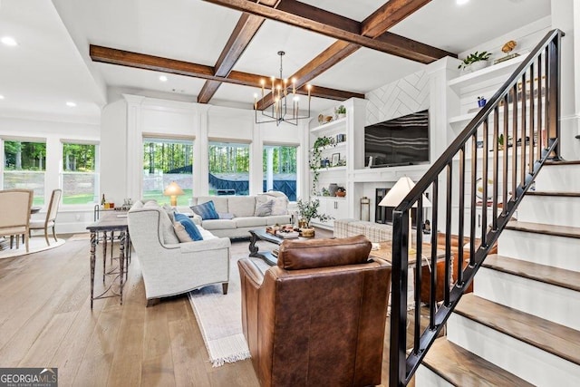 2381 Jones Phillips Rd, Dacula, GA 30019 - living room featuring hardwood / wood-style floors, a chandelier, beamed ceiling, stairs, and recessed lighting