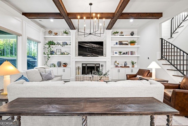 2381 Jones Phillips Rd, Dacula, GA 30019 - living area featuring a chandelier, stairway, coffered ceiling, beam ceiling, and a fireplace