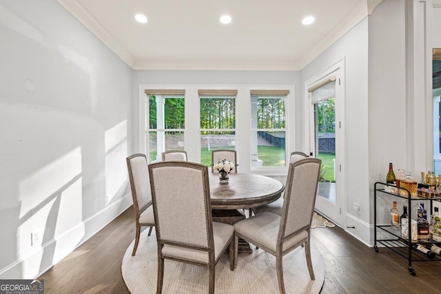 2381 Jones Phillips Rd, Dacula, GA 30019 - dining space featuring ornamental molding, dark wood-style flooring, and recessed lighting
