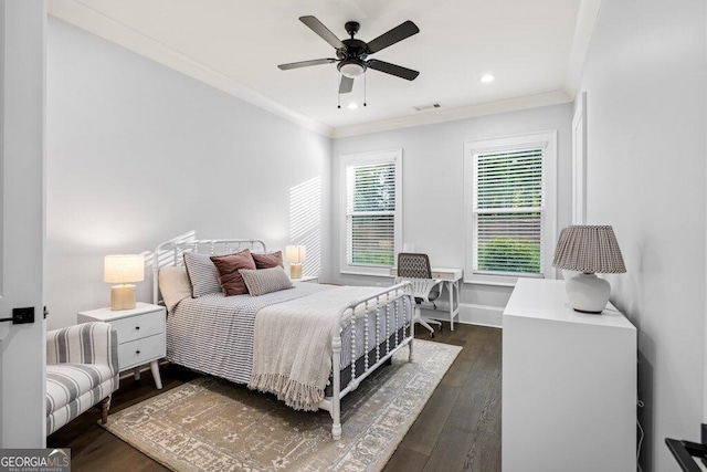 2381 Jones Phillips Rd, Dacula, GA 30019 - bedroom with dark wood finished floors, ornamental molding, and a ceiling fan