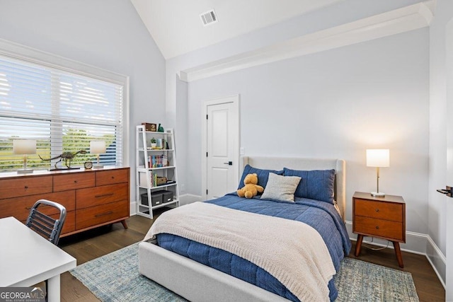 2381 Jones Phillips Rd, Dacula, GA 30019 - bedroom with vaulted ceiling and dark wood-style floors