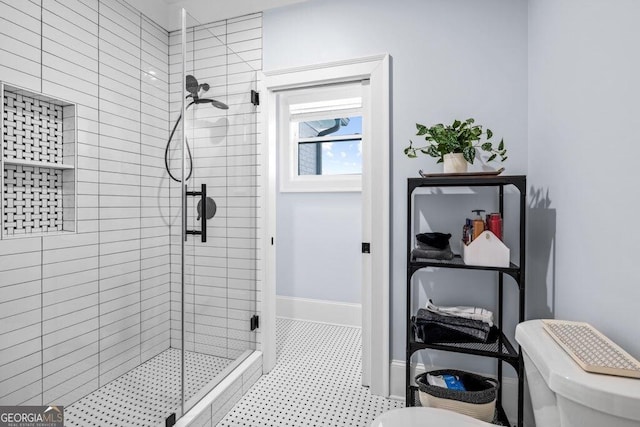 2381 Jones Phillips Rd, Dacula, GA 30019 - full bathroom featuring toilet and a shower stall