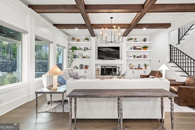 2381 Jones Phillips Rd, Dacula, GA 30019 - living area with dark wood-style floors, coffered ceiling, stairway, beam ceiling, and a chandelier