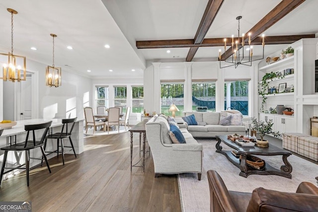 2381 Jones Phillips Rd, Dacula, GA 30019 - living room featuring a chandelier, wood finished floors, beam ceiling, and recessed lighting