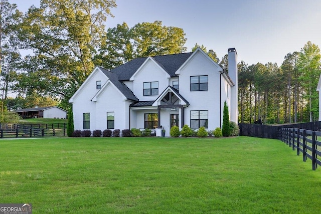 2381 Jones Phillips Rd, Dacula, GA 30019 - modern farmhouse with a chimney, a standing seam roof, and a metal roof