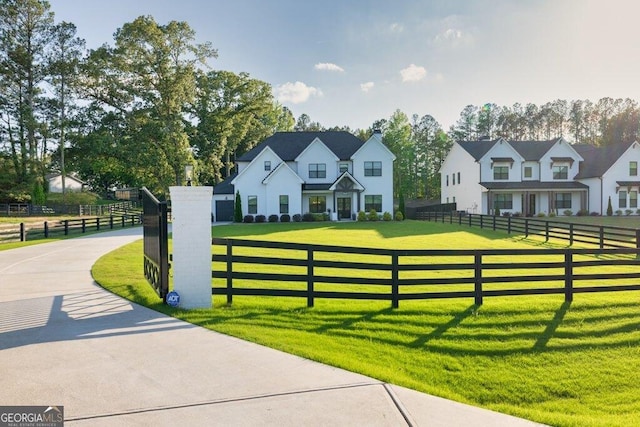 2381 Jones Phillips Rd, Dacula, GA 30019 - view of front facade with a fenced front yard