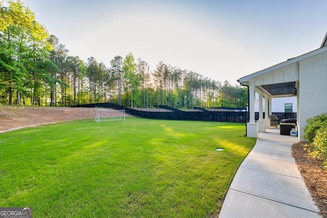2381 Jones Phillips Rd, Dacula, GA 30019 - view of yard featuring an area for sports and view of wooded area