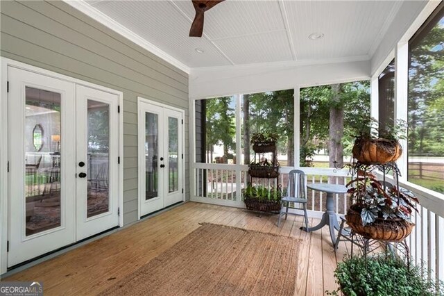 5301 Regency Lake Ct, Sugar Hill, GA 30518 - sunroom with french doors, plenty of natural light, and a ceiling fan