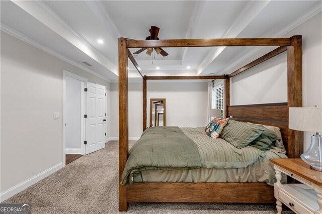 5301 Regency Lake Ct, Sugar Hill, GA 30518 - carpeted bedroom with crown molding, a tray ceiling, and recessed lighting