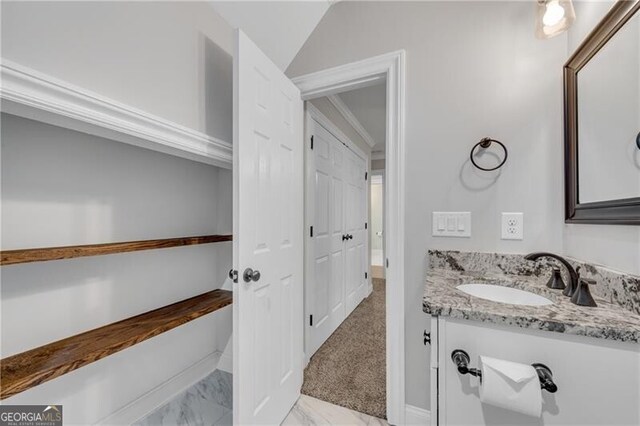 5301 Regency Lake Ct, Sugar Hill, GA 30518 - bedroom with carpet floors, crown molding, connected bathroom, and ceiling fan