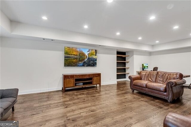 5301 Regency Lake Ct, Sugar Hill, GA 30518 - living area featuring dark wood-type flooring and recessed lighting