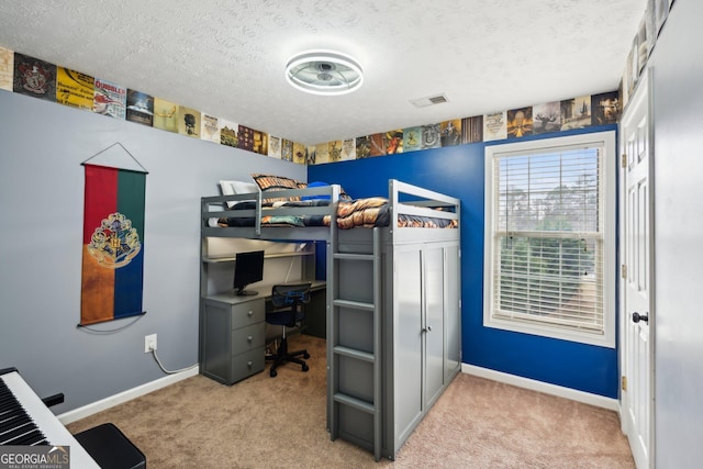 5686 Grindstone Dr, Buford, GA 30518 - carpeted bedroom with an office area and a textured ceiling