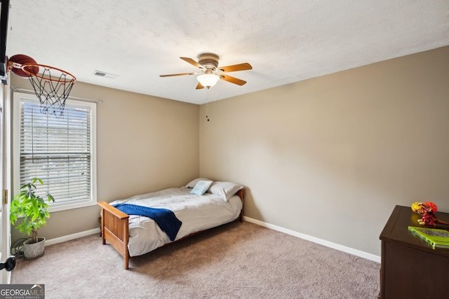 5686 Grindstone Dr, Buford, GA 30518 - bedroom featuring carpet flooring, a textured ceiling, and ceiling fan