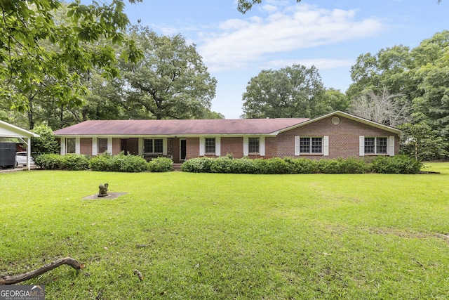 8692 Estes Rd, Macon, GA 31220 - ranch-style house with brick siding and a front lawn