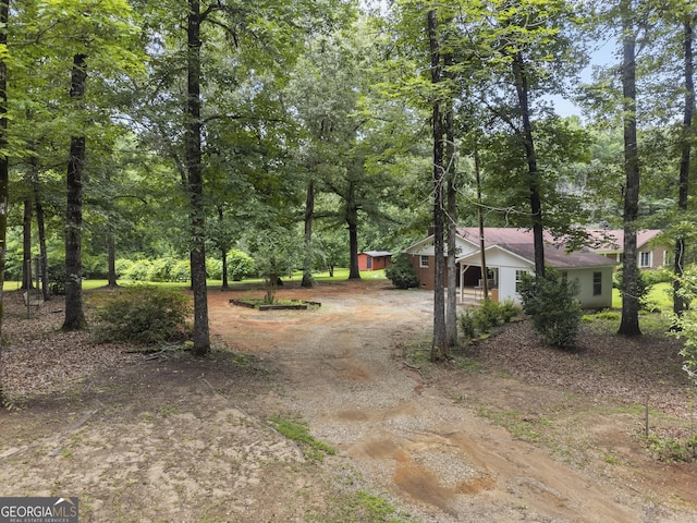 8692 Estes Rd, Macon, GA 31220 - view of yard featuring driveway