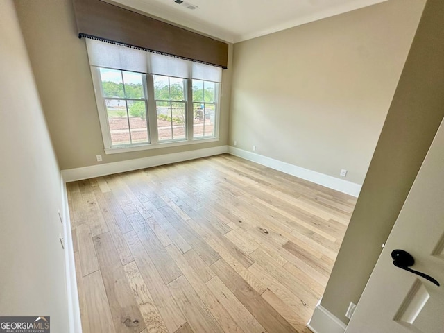 24 Lakewood Park N, Statham, GA 30666 - unfurnished room with baseboards and hardwood / wood-style floors