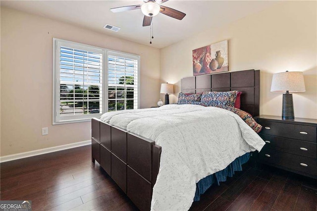 5285 Winflow Way, Suwanee, GA 30024 - bedroom featuring dark wood-style floors and ceiling fan
