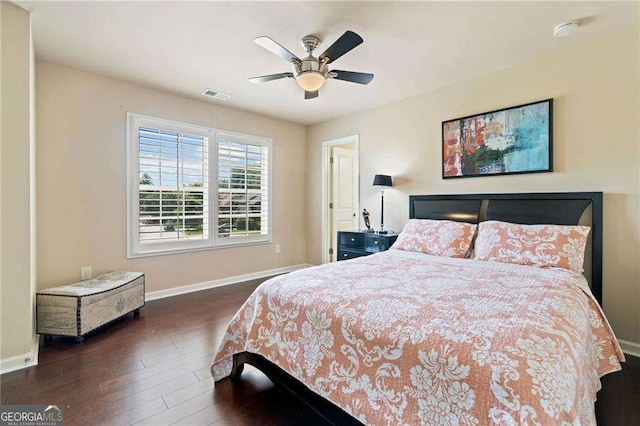 5285 Winflow Way, Suwanee, GA 30024 - bedroom with wood finished floors and a ceiling fan