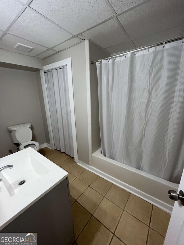 3351 Fox St, Duluth, GA 30096 - bathroom featuring tile patterned floors, shower / bath combo with shower curtain, vanity, and a drop ceiling
