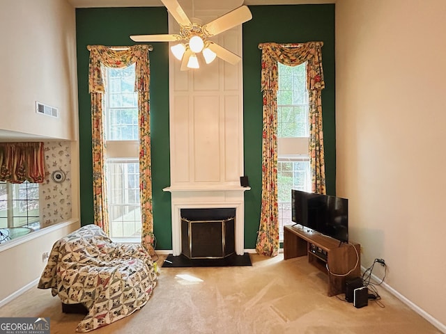 5190 Bankside Way, Peachtree Corners, GA 30092 - living area featuring carpet flooring, a fireplace, a ceiling fan, and a high ceiling