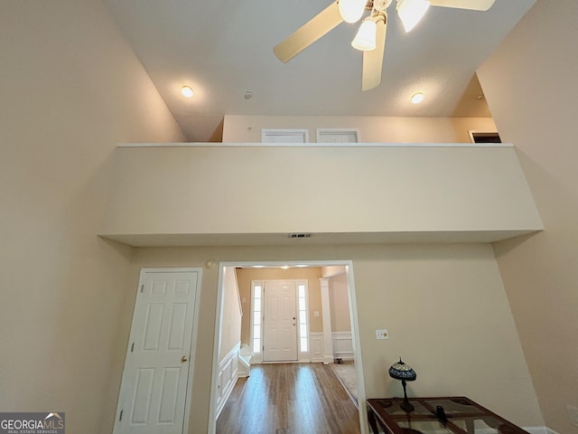 5190 Bankside Way, Peachtree Corners, GA 30092 - foyer entrance featuring wood finished floors, a ceiling fan, a wainscoted wall, and a decorative wall