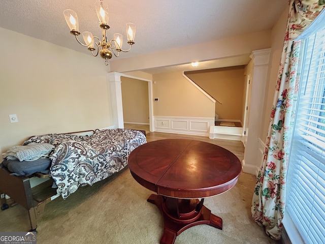 5190 Bankside Way, Peachtree Corners, GA 30092 - bedroom featuring a textured ceiling, light colored carpet, and a chandelier