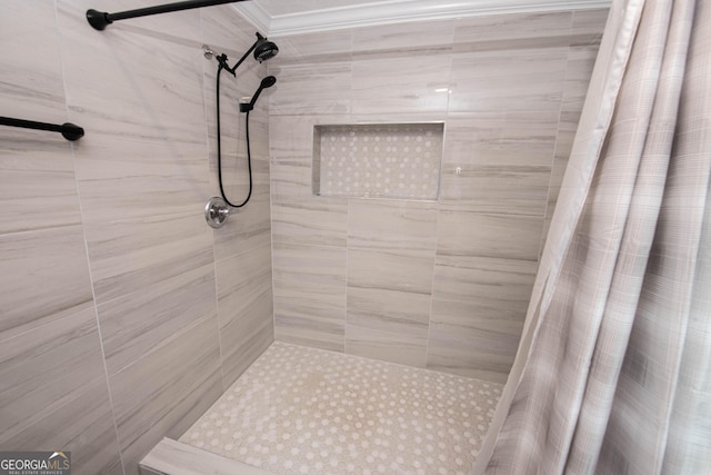 5763 Houston Rd, Macon, GA 31216 - bathroom featuring tiled shower and crown molding