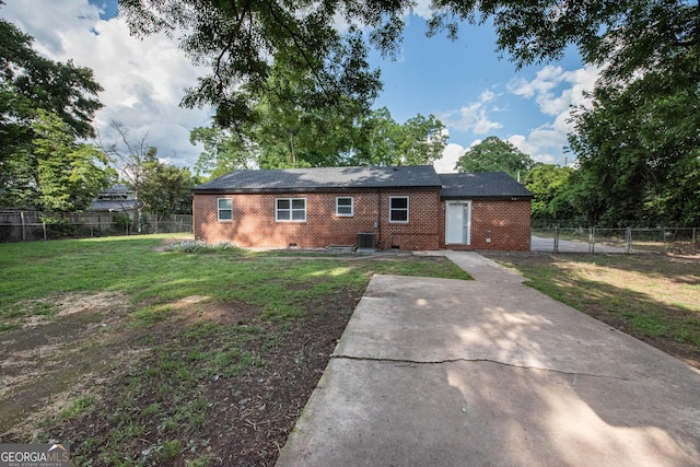 5763 Houston Rd, Macon, GA 31216 - view of front of house with brick siding and a fenced backyard