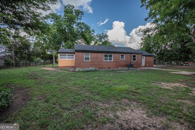 5763 Houston Rd, Macon, GA 31216 - view of home's exterior with brick siding and a central air condition unit