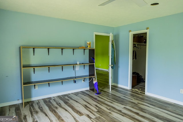 83 Manning Lake Rd SW, Rome, GA 30165 - unfurnished bedroom featuring wood finished floors and a closet