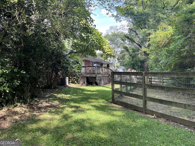 201 Glen Iris Dr, Monroe, GA 30655 - view of yard with a wooden deck