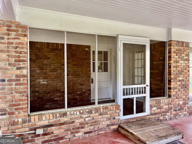 201 Glen Iris Dr, Monroe, GA 30655 - doorway to property featuring brick siding