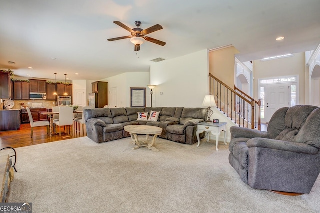 312 Relative Trl, Mcdonough, GA 30253 - living room with ceiling fan, stairway, carpet, and recessed lighting
