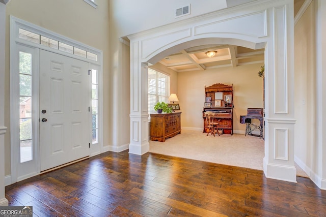 312 Relative Trl, Mcdonough, GA 30253 - entrance foyer featuring arched walkways, coffered ceiling, dark wood finished floors, beamed ceiling, and ornate columns