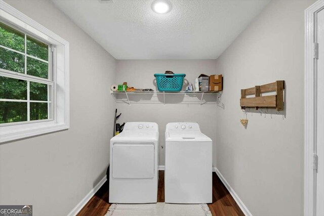 1050 Birdseye Vw, Locust Grove, GA 30248 - laundry room with independent washer and dryer, wood finished floors, and a textured ceiling