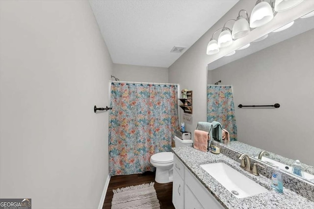 1050 Birdseye Vw, Locust Grove, GA 30248 - full bathroom featuring wood finished floors, vanity, and a shower with shower curtain
