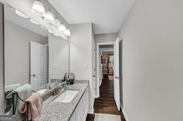 1050 Birdseye Vw, Locust Grove, GA 30248 - bathroom featuring wood finished floors and vanity