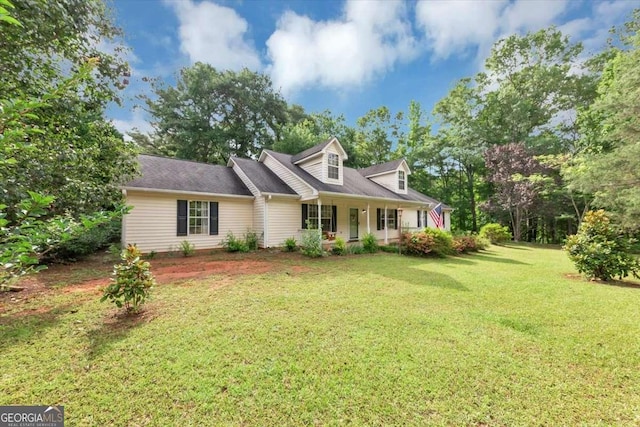 1050 Birdseye Vw, Locust Grove, GA 30248 - cape cod home featuring a front yard
