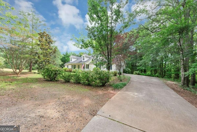 1050 Birdseye Vw, Locust Grove, GA 30248 - view of front facade featuring driveway