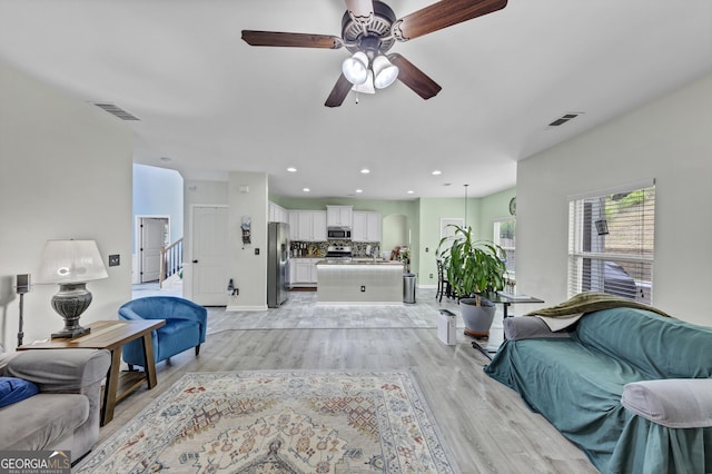 226 Creek View Ln, Acworth, GA 30102 - living room with light wood finished floors, a ceiling fan, and recessed lighting