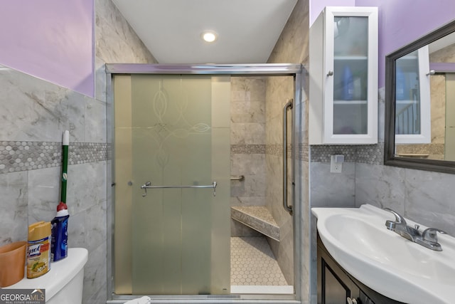 226 Creek View Ln, Acworth, GA 30102 - bathroom featuring tile walls, vanity, and a shower stall