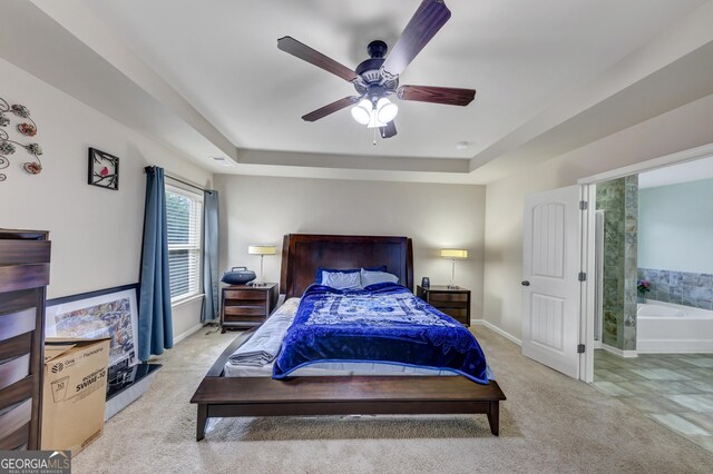 226 Creek View Ln, Acworth, GA 30102 - carpeted bedroom featuring a tray ceiling and a ceiling fan