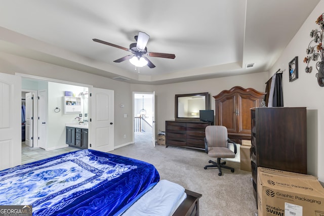 226 Creek View Ln, Acworth, GA 30102 - bedroom with a raised ceiling, light carpet, ensuite bathroom, and ceiling fan