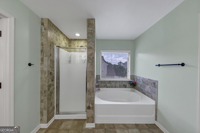 226 Creek View Ln, Acworth, GA 30102 - bathroom with a bath, a stall shower, and tile patterned flooring