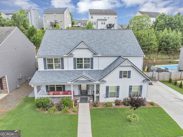 226 Creek View Ln, Acworth, GA 30102 - traditional home featuring covered porch, roof with shingles, and a residential view