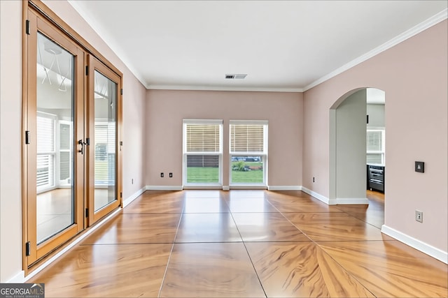 226 Creek View Ln, Acworth, GA 30102 - empty room with arched walkways, plenty of natural light, crown molding, and french doors