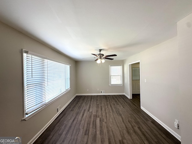 2015 Boulderview Dr SE, Atlanta, GA 30316 - empty room with dark wood-type flooring and a ceiling fan