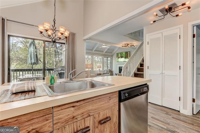 125 Wolfscratch, Big Canoe, GA 30143 - kitchen featuring stainless steel dishwasher, a chandelier, decorative light fixtures, light wood-type flooring, and light countertops